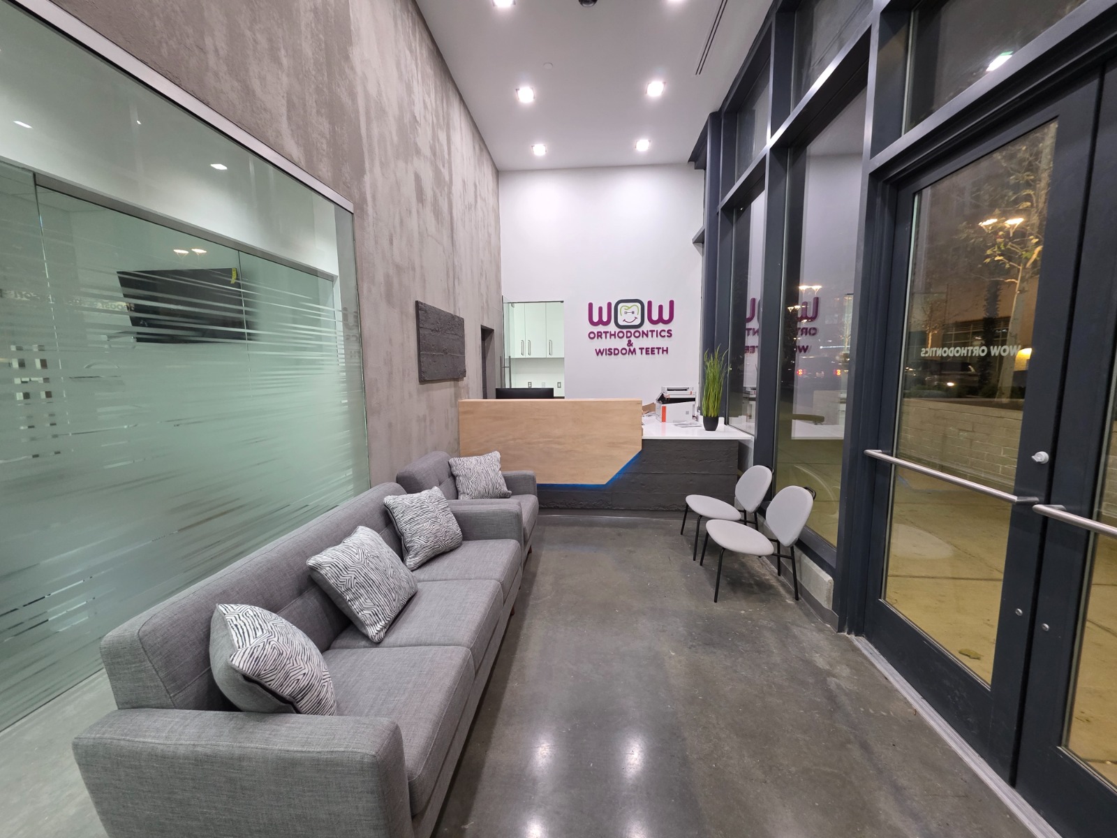 Reception desk and waiting area at WOW Orthodontics